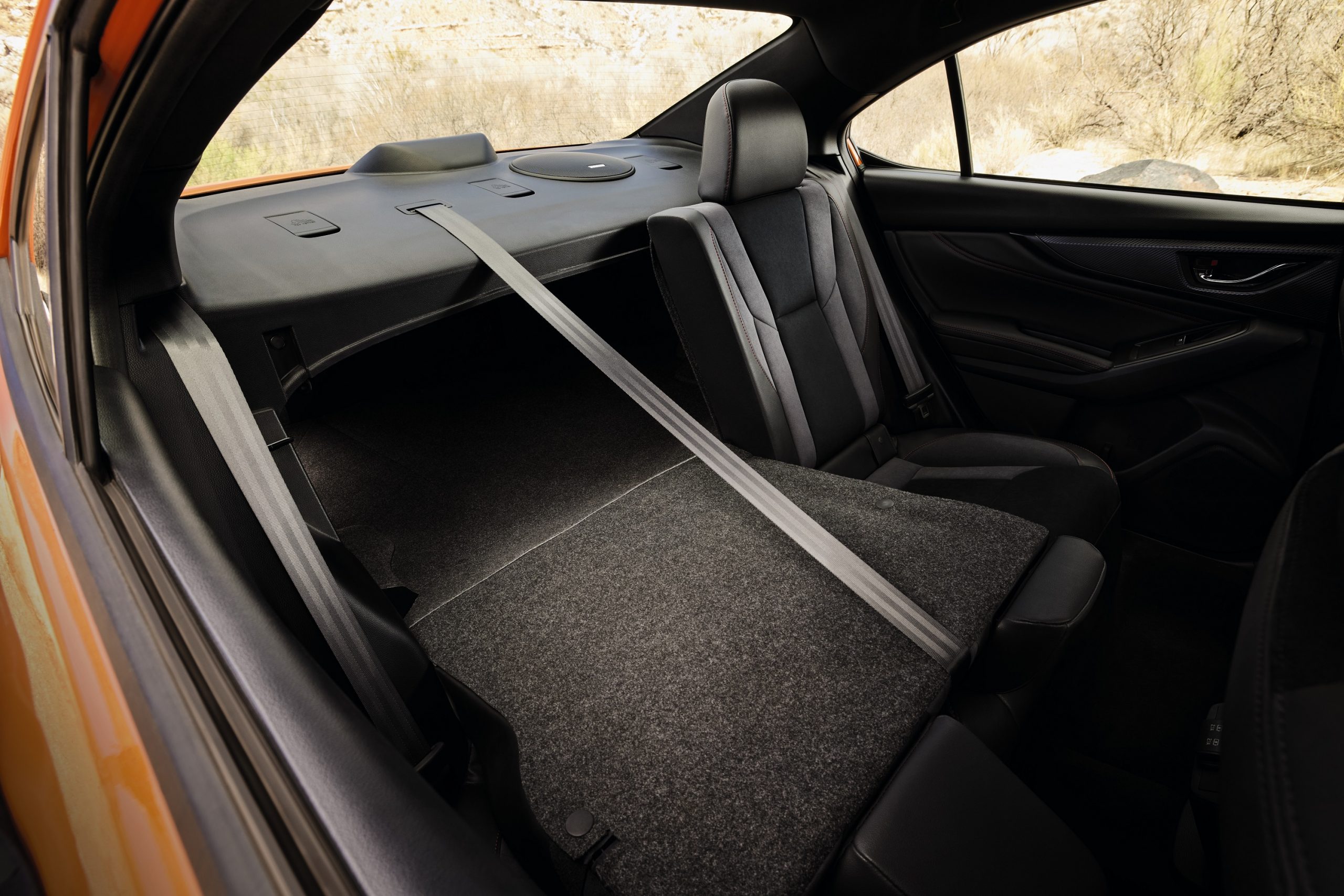 The rear passenger space of the WRX with the seats down