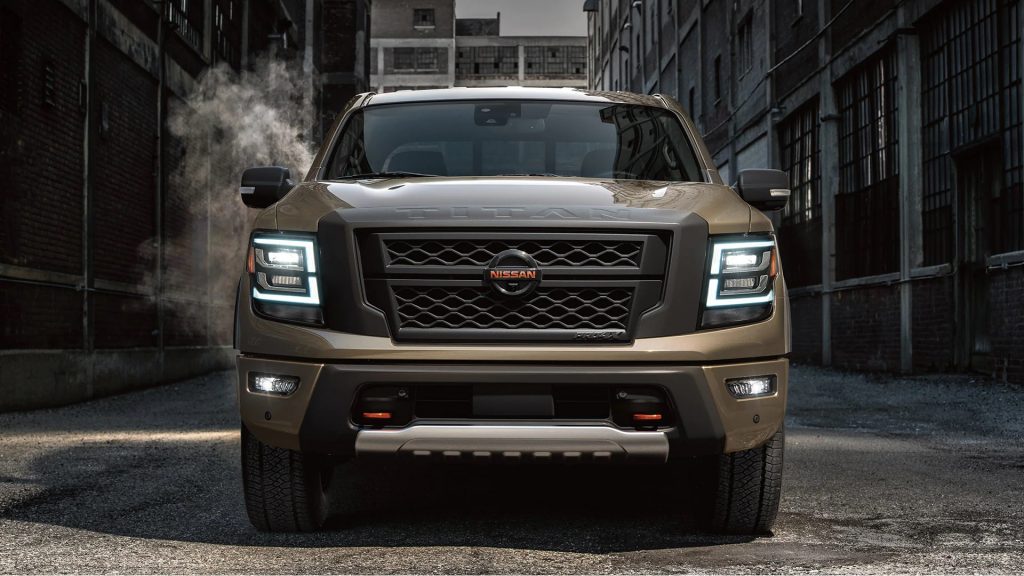 A beige 2022 Nissan Titan pickup truck, it offers a standard V8 other pickups forgot about. 