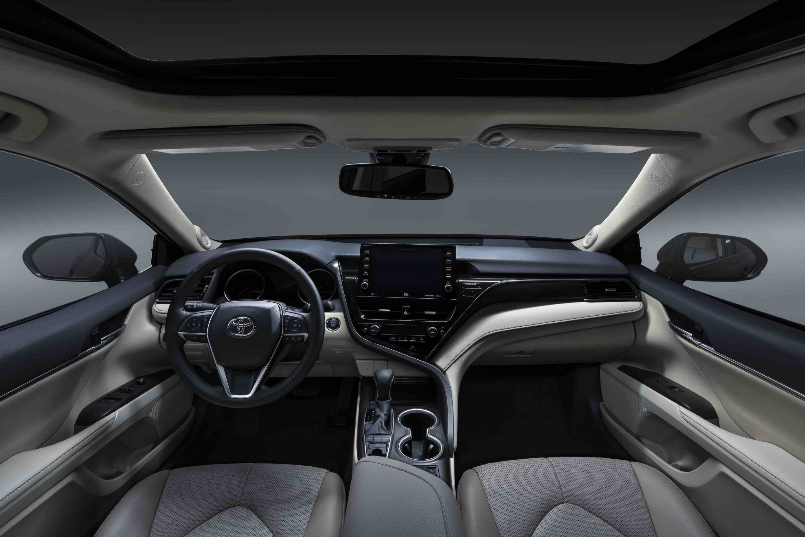 The 2022 Toyota Camry's interior with beige leather