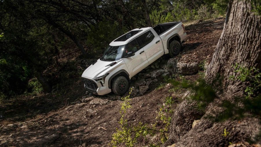 2022 Toyota Tundra descending a muddy hill showing it may be a hybrid but that don't make it anything like the Toyota Prius