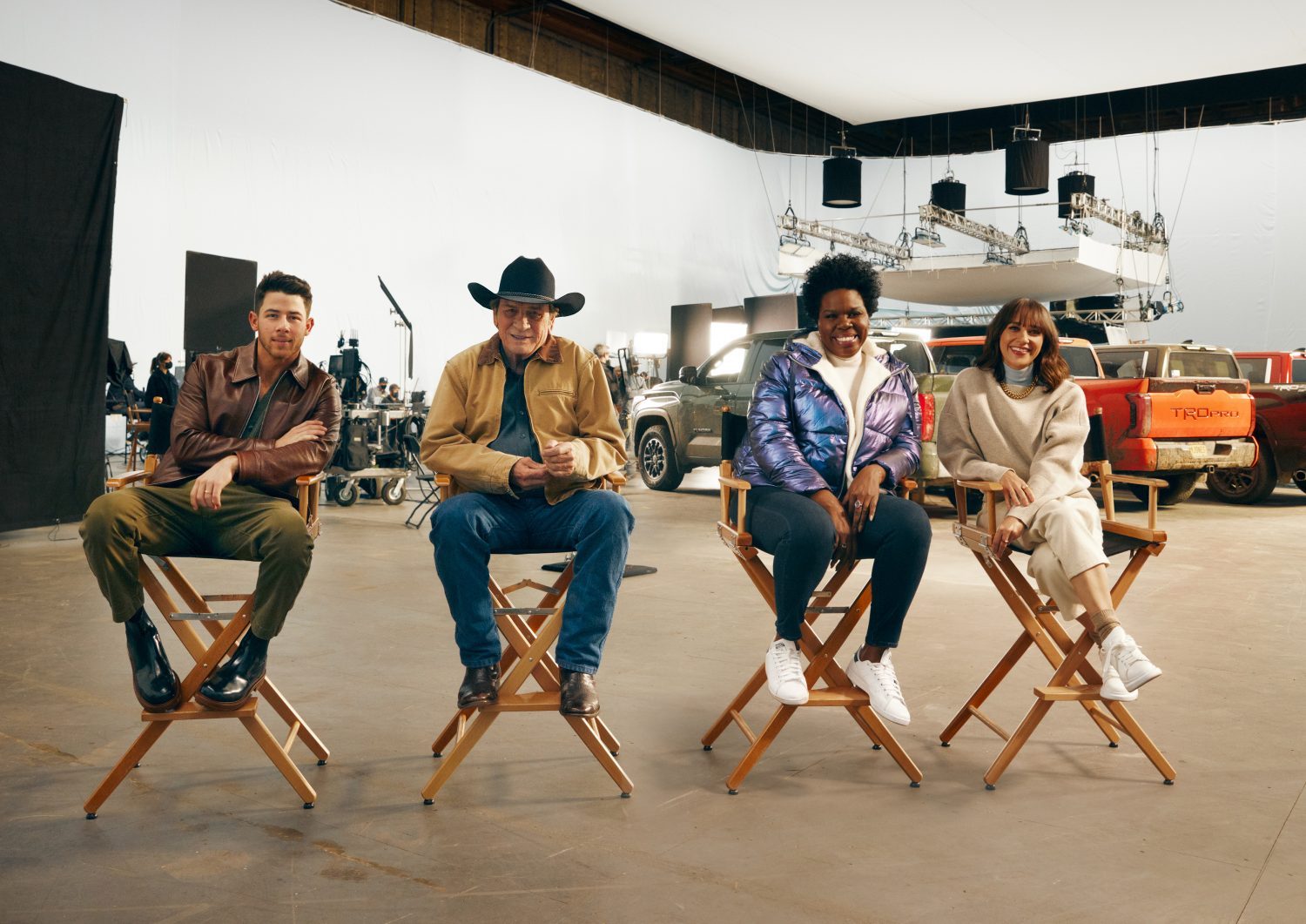 Nick Jonas, Tommy Lee Jones, Leslie Jones, and Rashida Jones on the set of "The Joneses" Super Bowl TV commercial