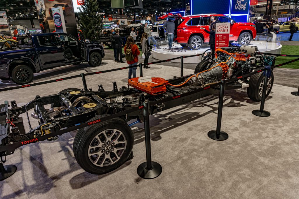 A bare 2022 Toyota Tundra chassis with hybrid powertrain