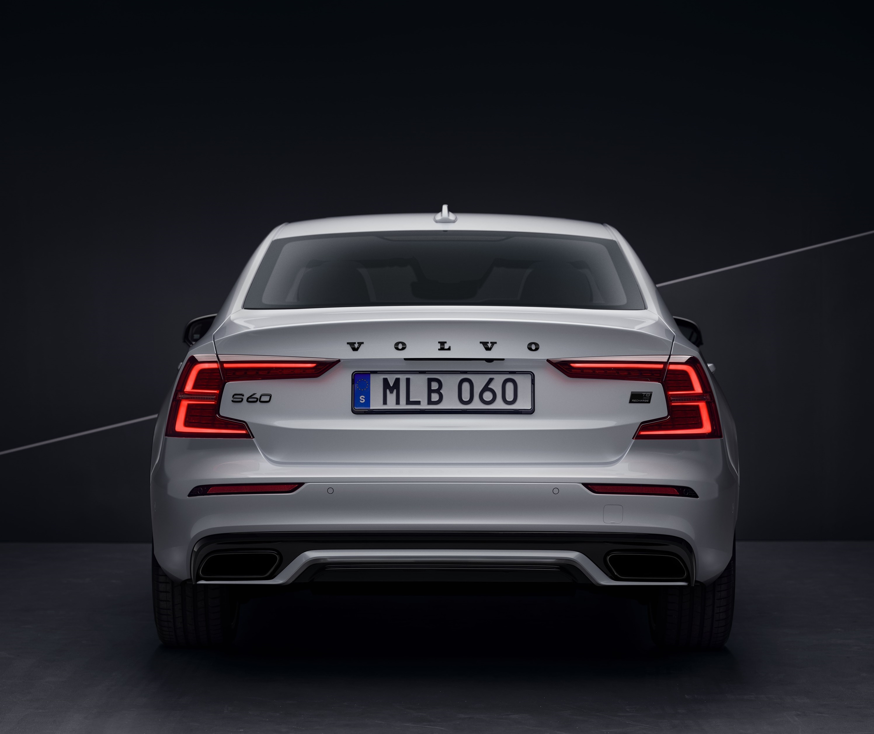 The rear view of a white 2022 Volvo S60 Recharge Black Edition