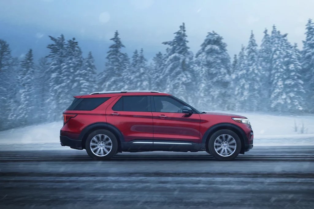 The Ford Explorer Limited SUV in red. Ford is cutting features thanks to a missing chip.