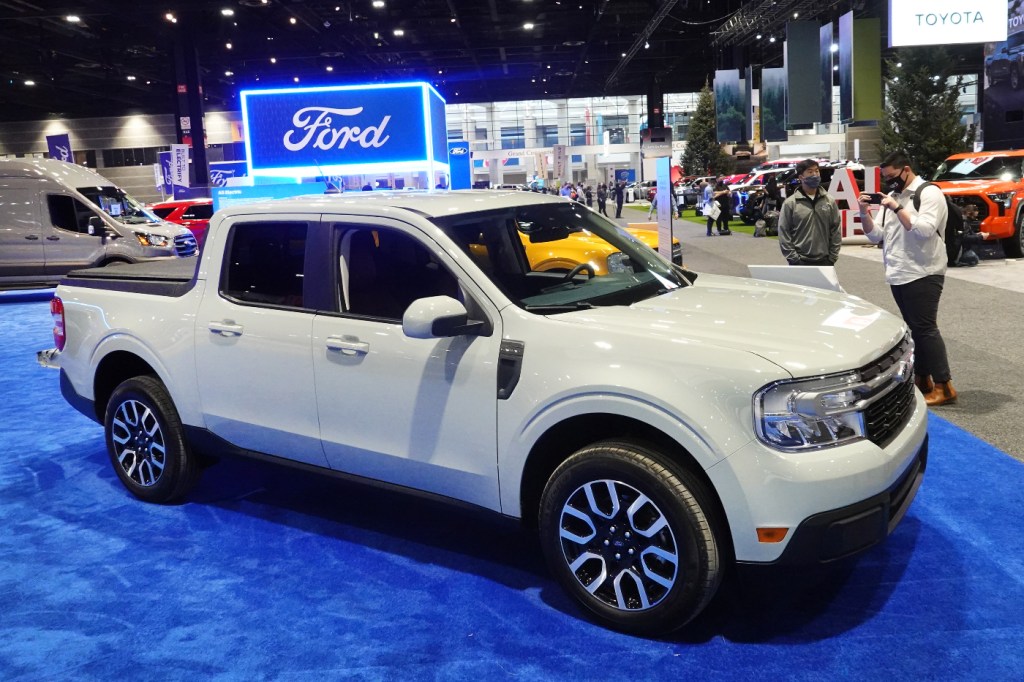 A Ford Maverick is shown off at an auto show.