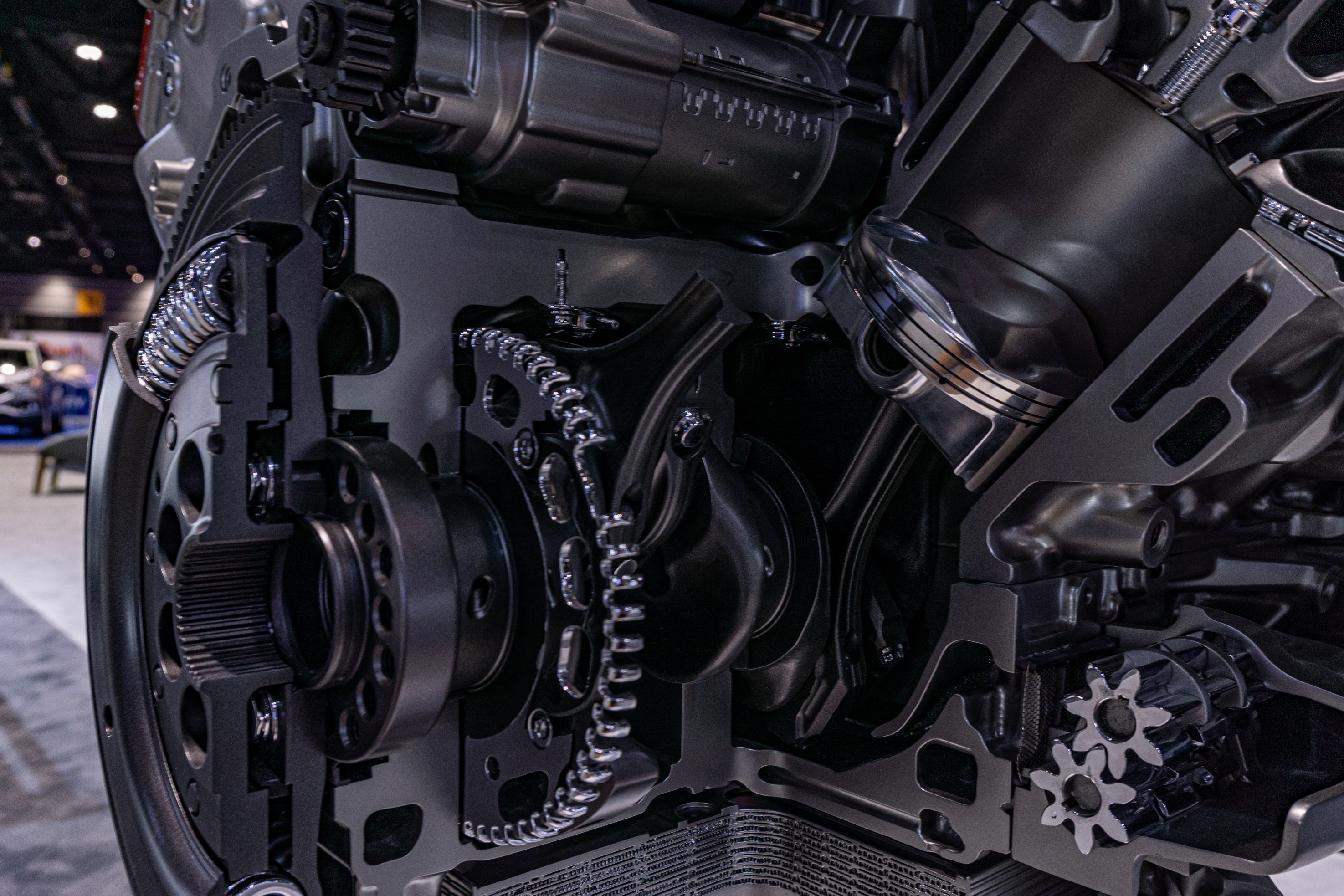 A close-up look of the 2023 C8 Chevrolet Corvette Z06 LT6 V8's flat-plane crank and piston at the Chicago Auto Show