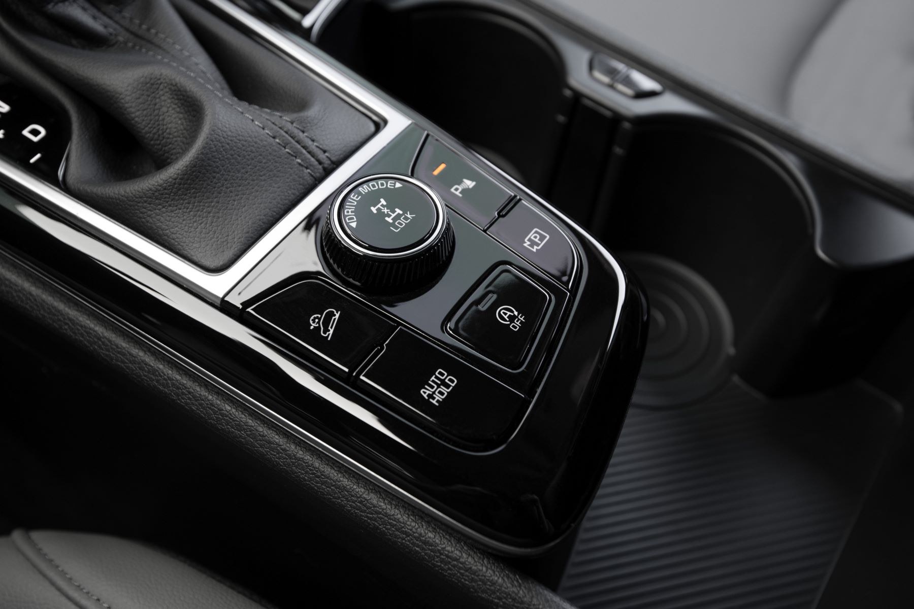 2023 Kia Sportage X-Pro transmission with driving mode option dial and buttons
