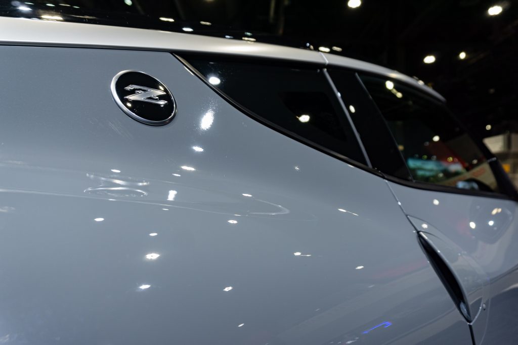The C-pillar badge on a gray 2023 Nissan Z