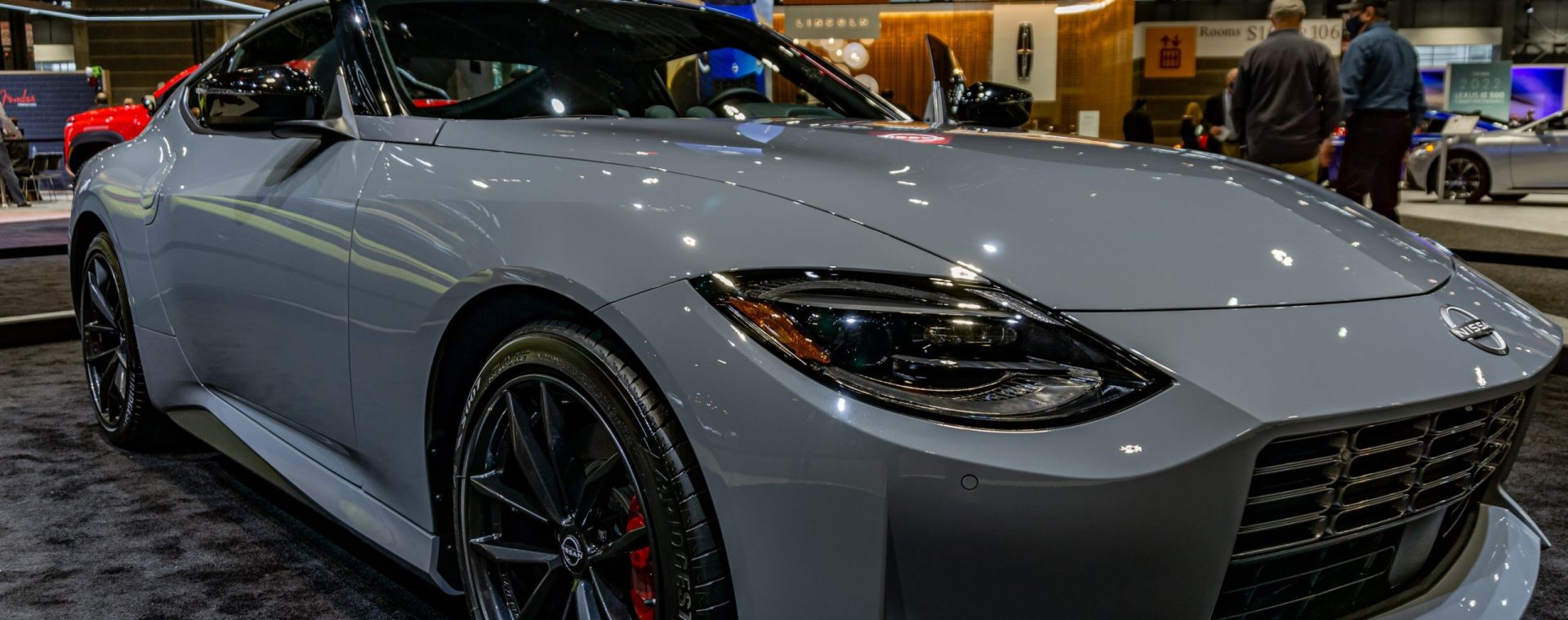 The front 3/4 view of a gray 2023 Nissan Z at the 2022 Chicago Auto Show