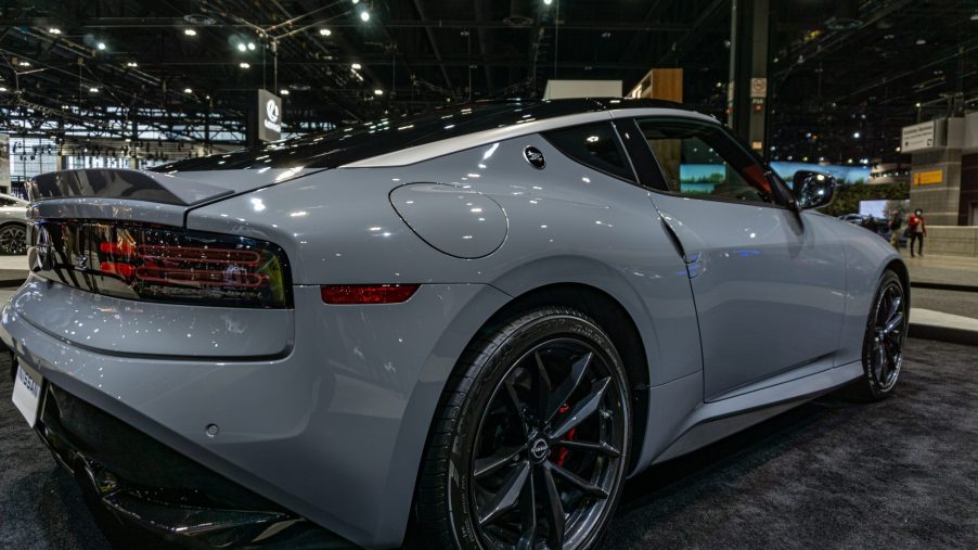 The rear 3/4 view of a gray 2023 Nissan Z Performance at the 2022 Chicago Auto Show