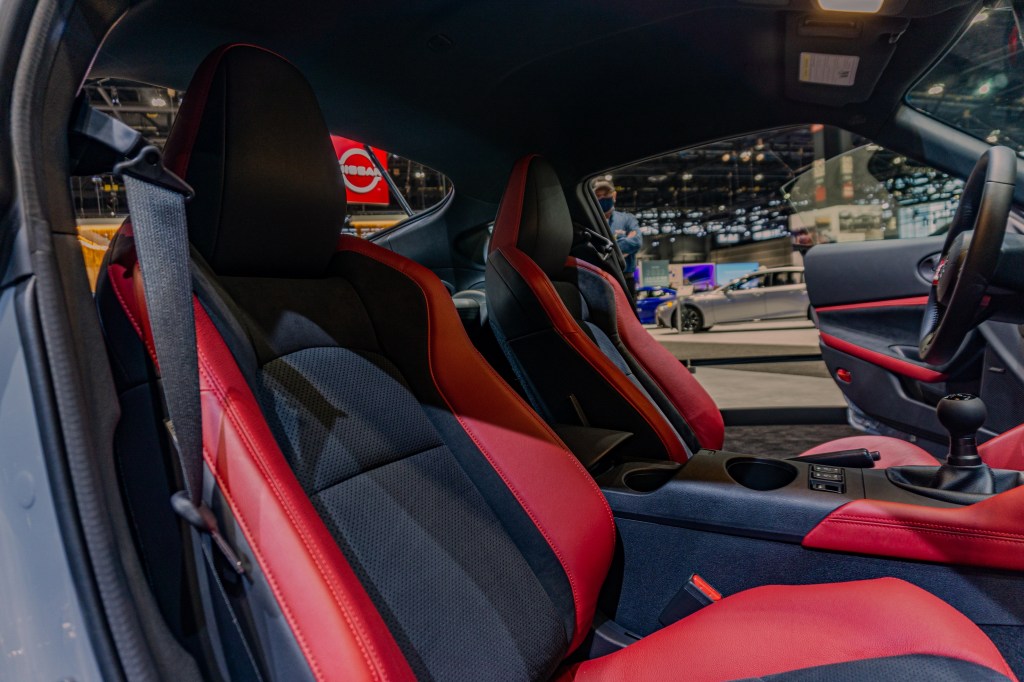 The red-and-black leather seats of a 2023 Nissan Z Performance
