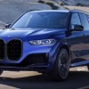2022 BMW X5 in blue on a track