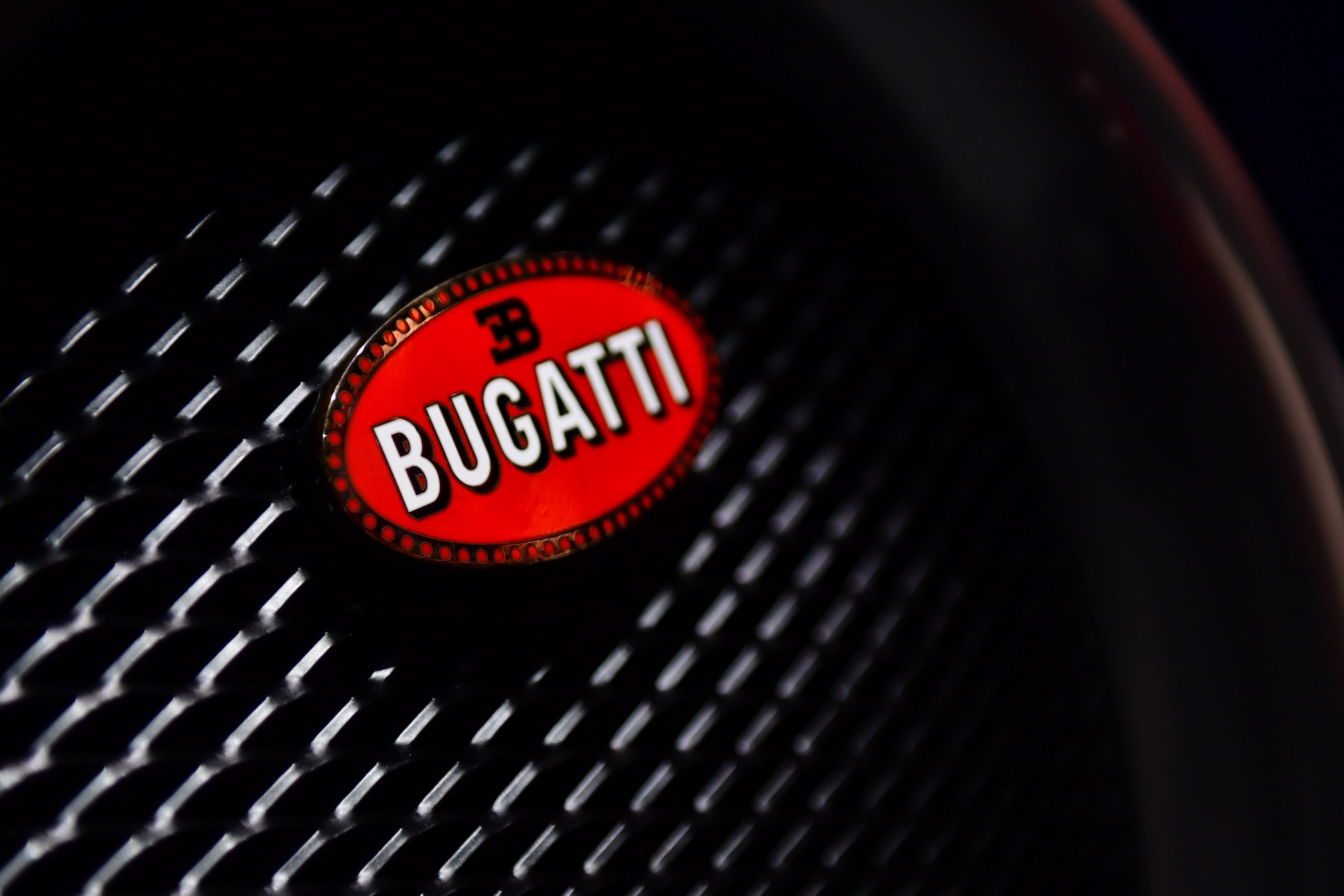 The Bugatti logo displayed on a Bugatti Chiron