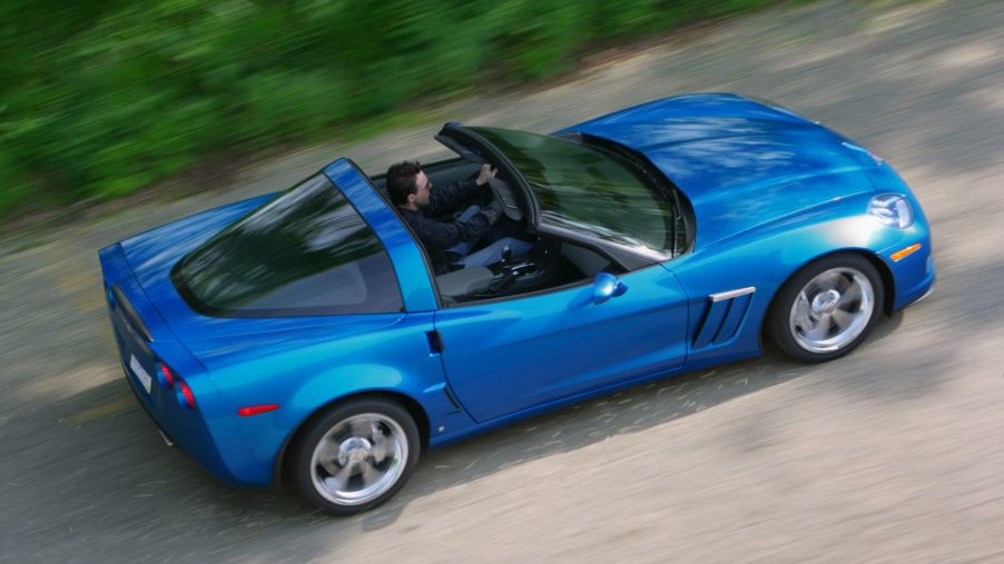 A blue Chevrolet Corvette convertible sports car shot from above