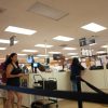 Customers wait in a DMV line