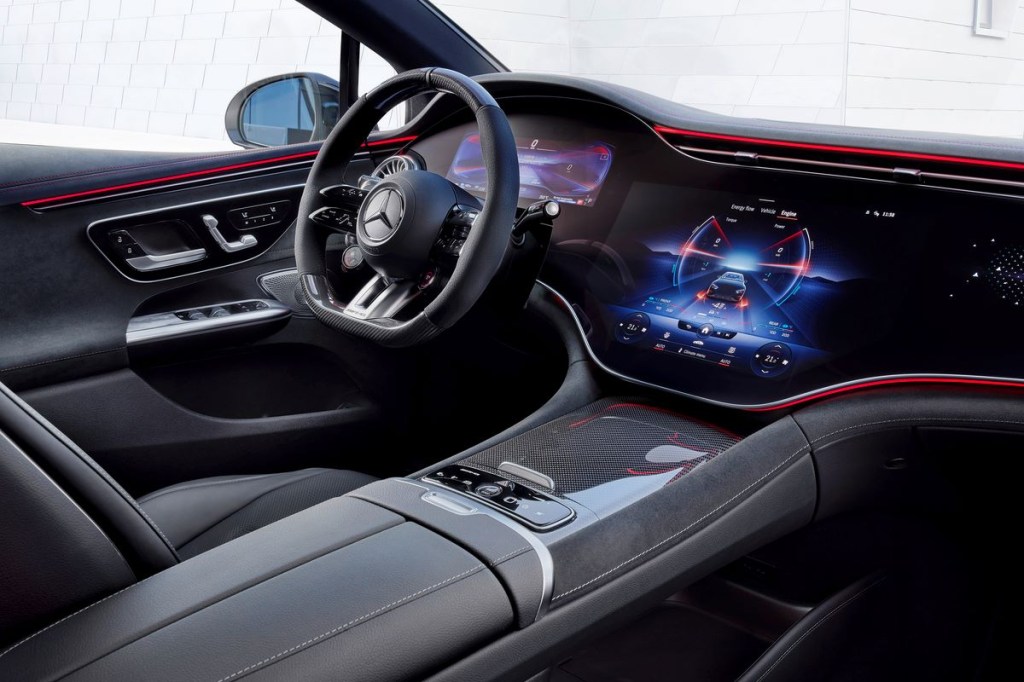 Dashboad and driver's seat in 2023 Mercedes-AMG EQE, highlighting its release date and price