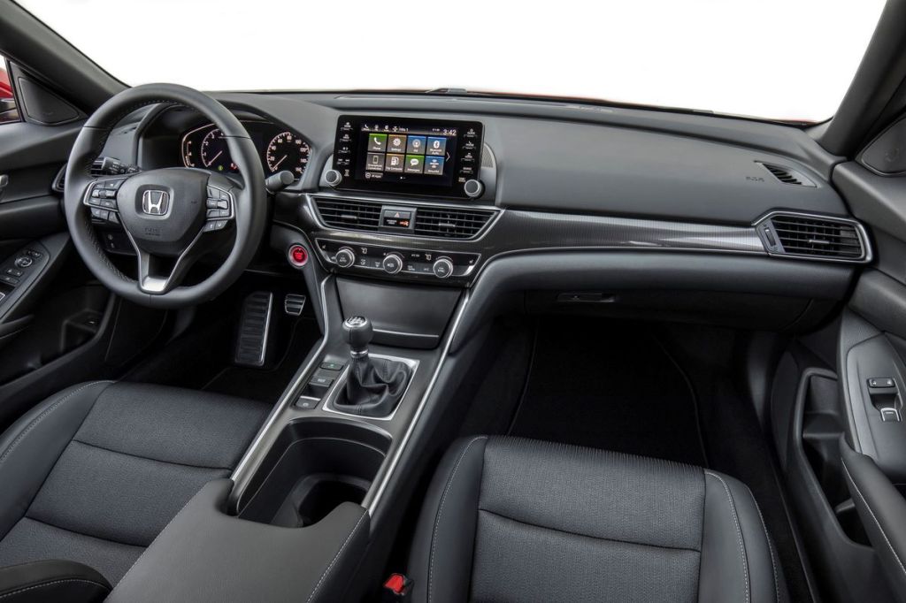 Dashboard and front seats of 2022 Honda Accord, highlighting release date and price of 2023 Accord