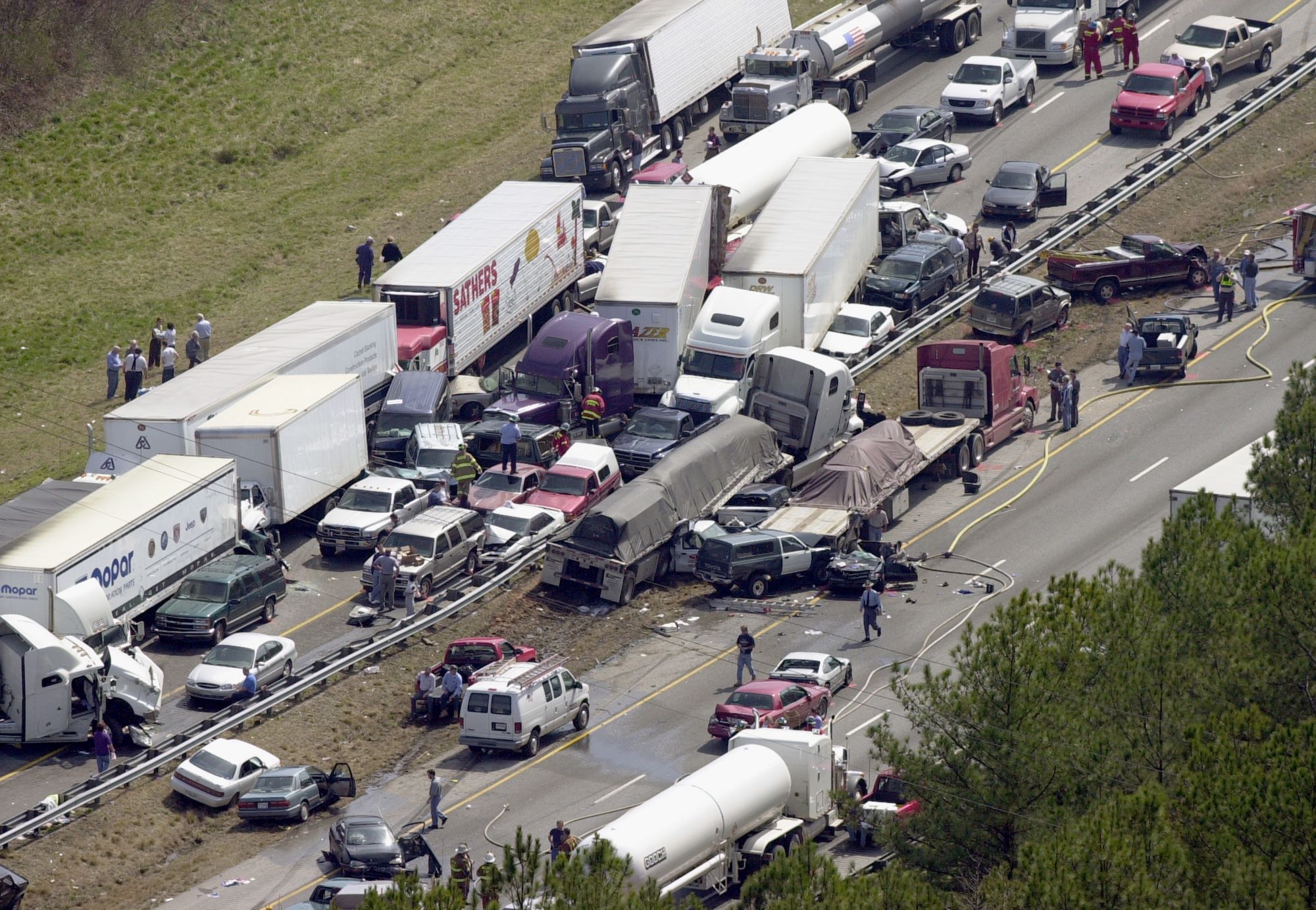 A multiple dearly car crash pileup on an interstate.