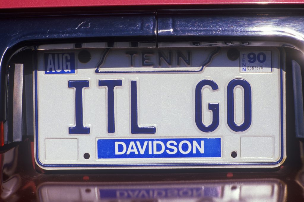 A blue on white vanity Tennessee license plate that reads "ITL Go."
