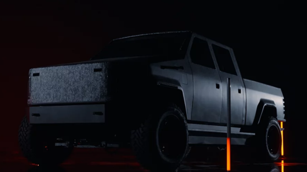 Driver's side front angle view of black Atlis XT, which could be the best electric pickup truck