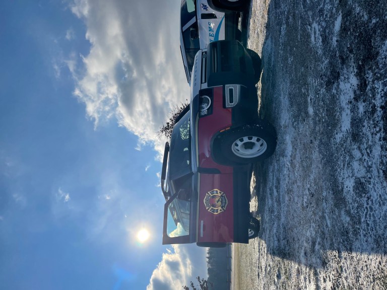 Fire and Rescue Land Rover Defender parked on ice 