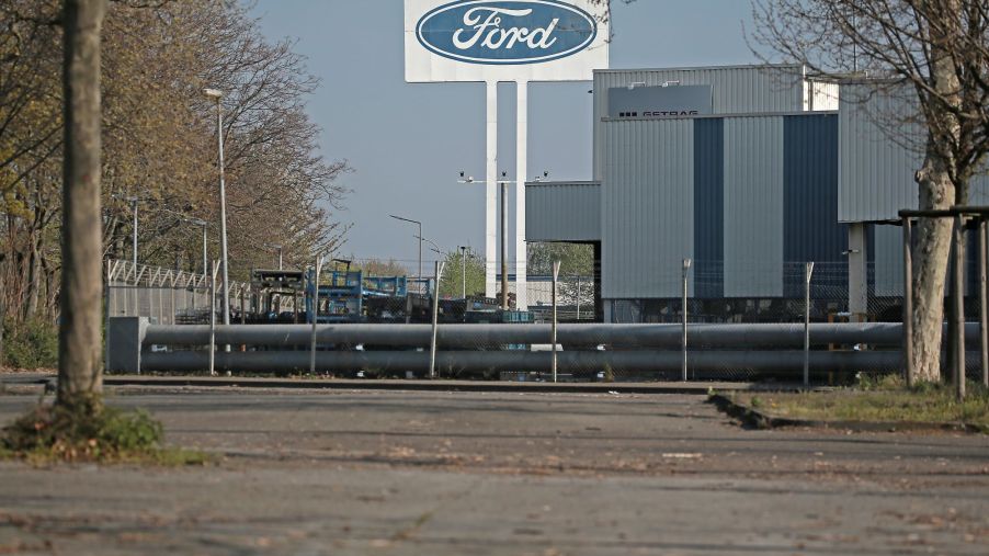 A Ford factory parking lot empty where Ford production stopped.