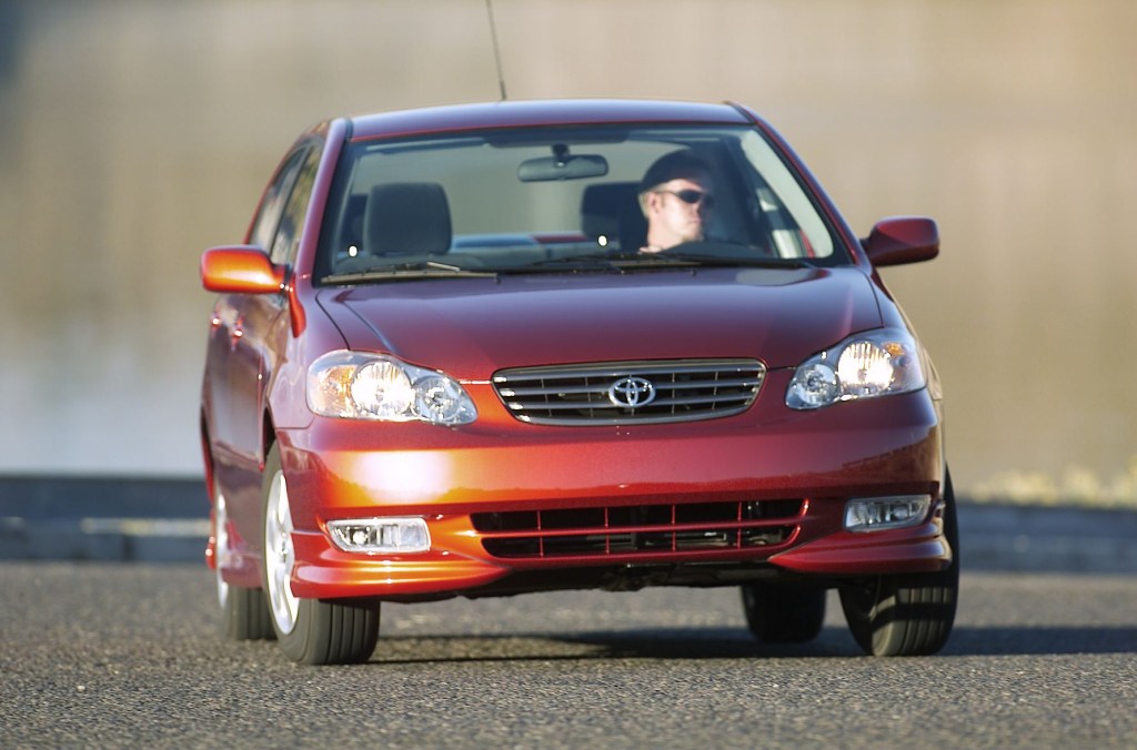 Front view of orange 2005 Toyota Corolla, one of the best used cars priced under $5,000