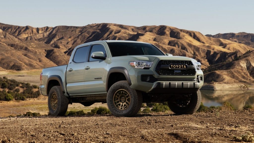 Gray 2022 Toyota Tacoma with mountains in background, highlighting release date and price of 2023 Toyota Tacoma