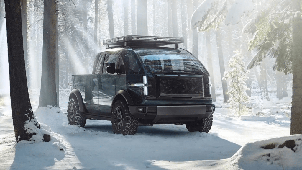 Electric 2023 Canoo Pickup Truck parked in a forest, highlighting its release date and price