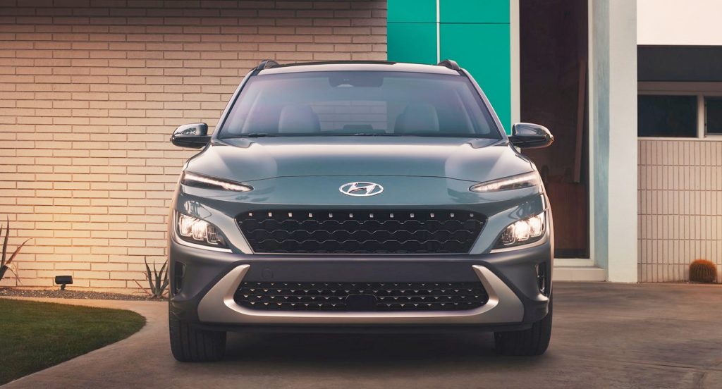 A blue 2022 Hyundai Kona subcompact SUV is parked.
