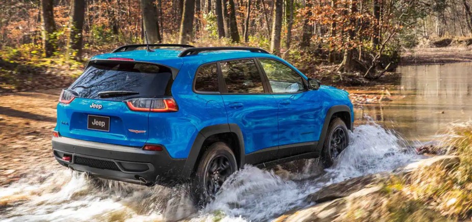 A 2022 Jeep Cherokee explores a water road.