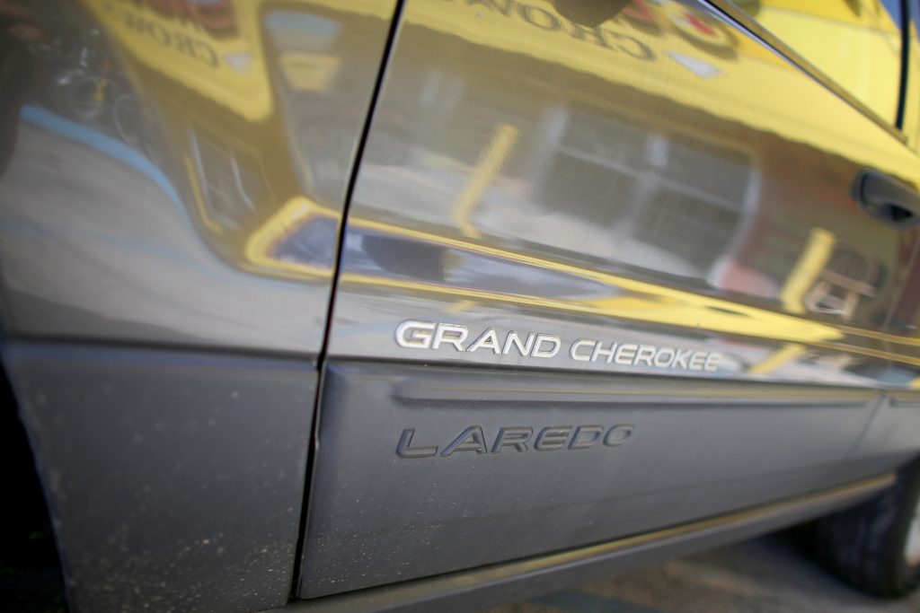 The side panel of a Jeep Grand Cherokee Laredo SUV.