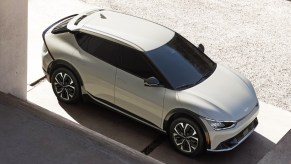 A white 2022 Kia EV6 is parked.