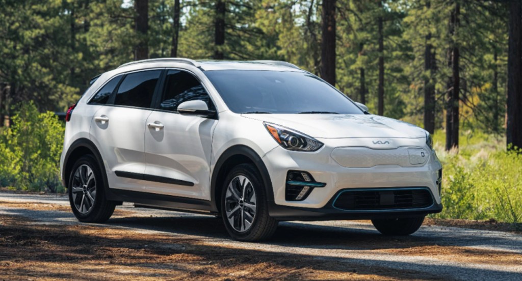 A white 2022 Kia Niro electric vehicle is parked.