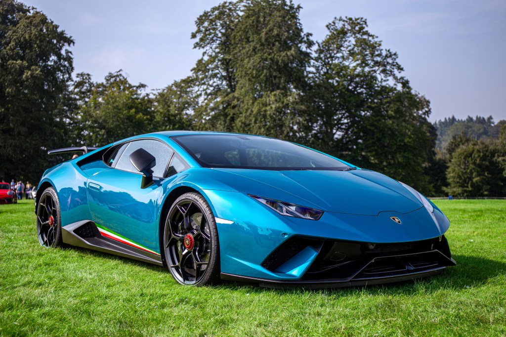 The Lamborghini Huracan Performante parked in the grass