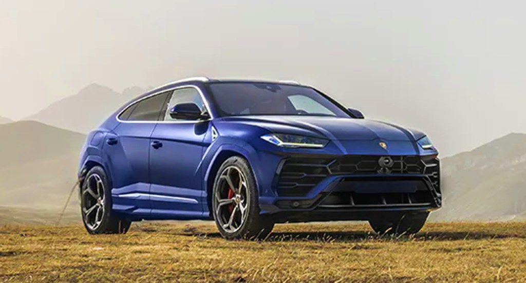 A blue 2022 Lamborghini Urus super-SUV is parked.