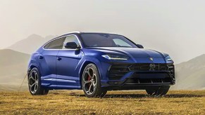 A blue 2022 Lamborghini Urus is parked.