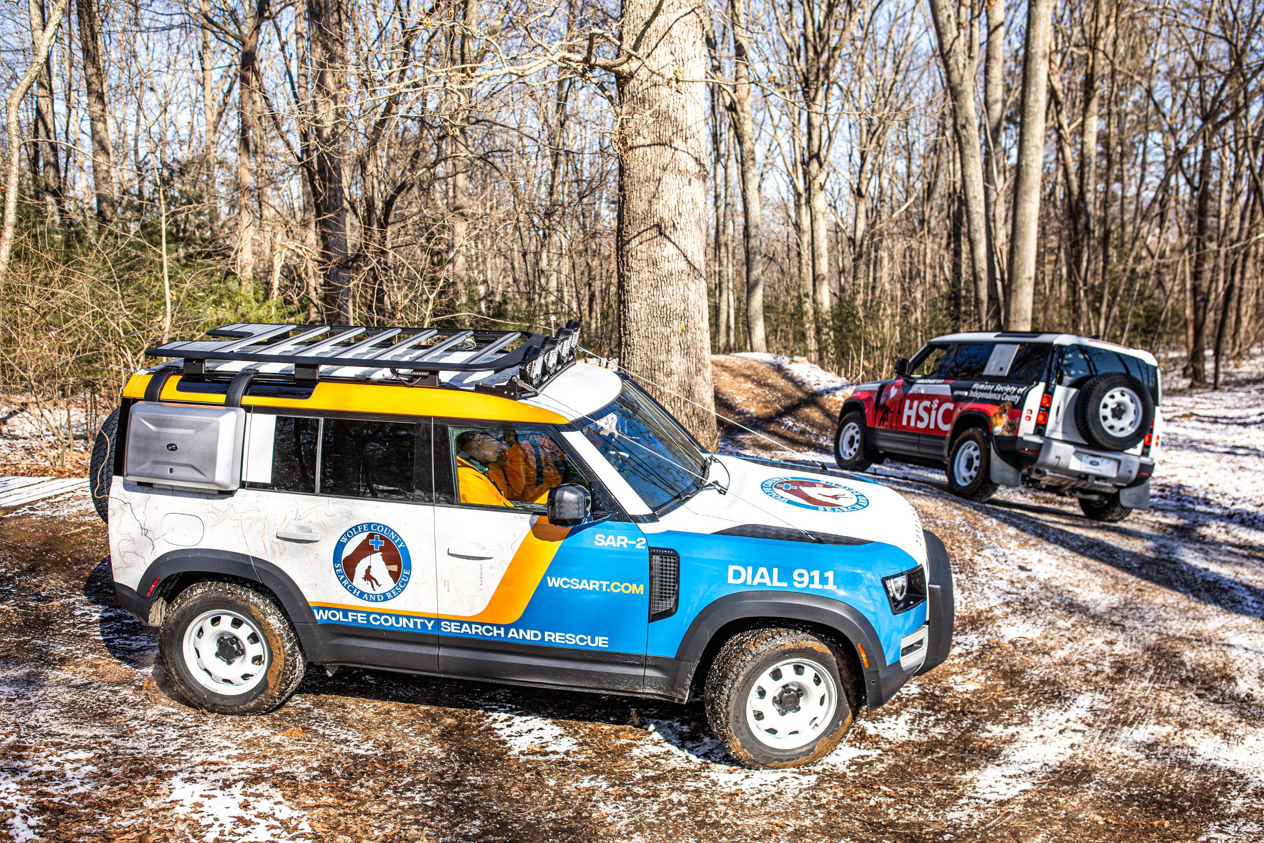 Land Rover Defender models off-roading
