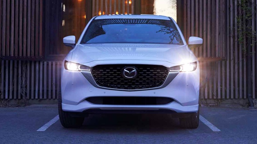 A white 2022 Mazda CX-5 compact SUV is parked.