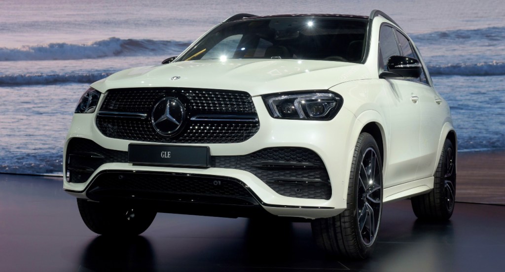 A white Mercedes-Benz GLE Class luxury compact SUV is on display.