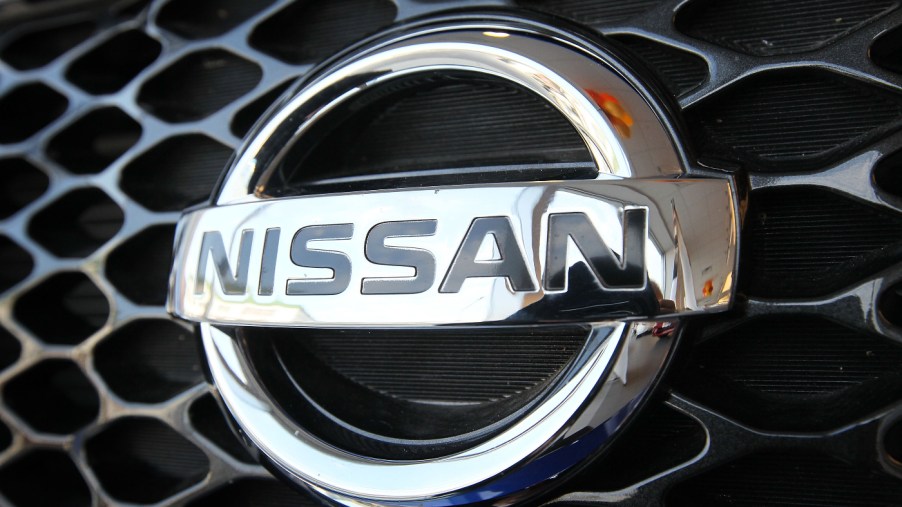 A badge from a Nissan vehicle.