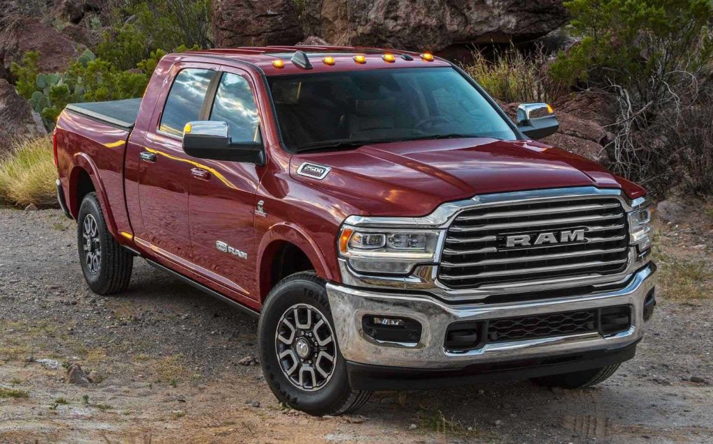 Passenger's side front angle view of maroon 2022 Ram 2500, highlighting cars Democrats and Republicans drive the most