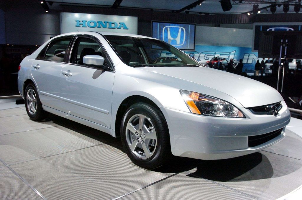 Passenger's side front angle view of silver 2005 Honda Accord, one of the best used cars priced under $5,000
