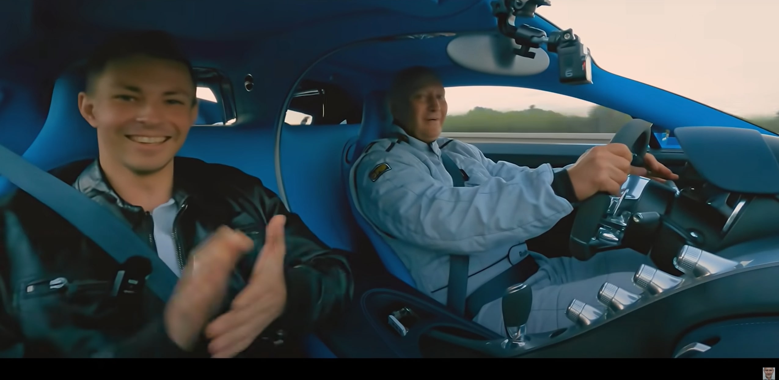 Radim Passer sits smiling in his Bugatti Chiron on the Autobahn