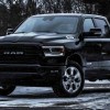 A black 2022 Ram 1500 full-size pickup truck is parked.