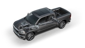 A cutaway of a 2022 Ram 1500 pickup truck with its eTorque mild hybrid components visible.