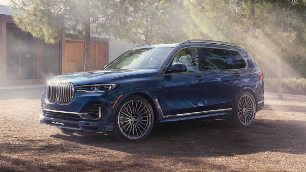 Side view of blue 2022 BMW X7, one of the Consumer Reports most reliable luxury SUVs for large families