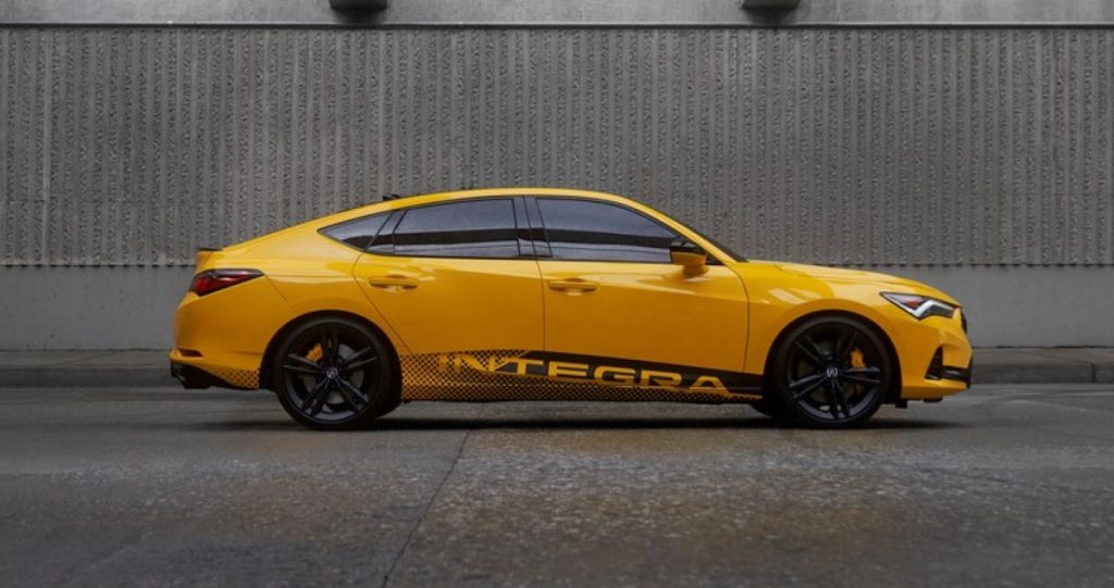 Side view of yellow 2023 Acura Integra, highlighting its release date and price