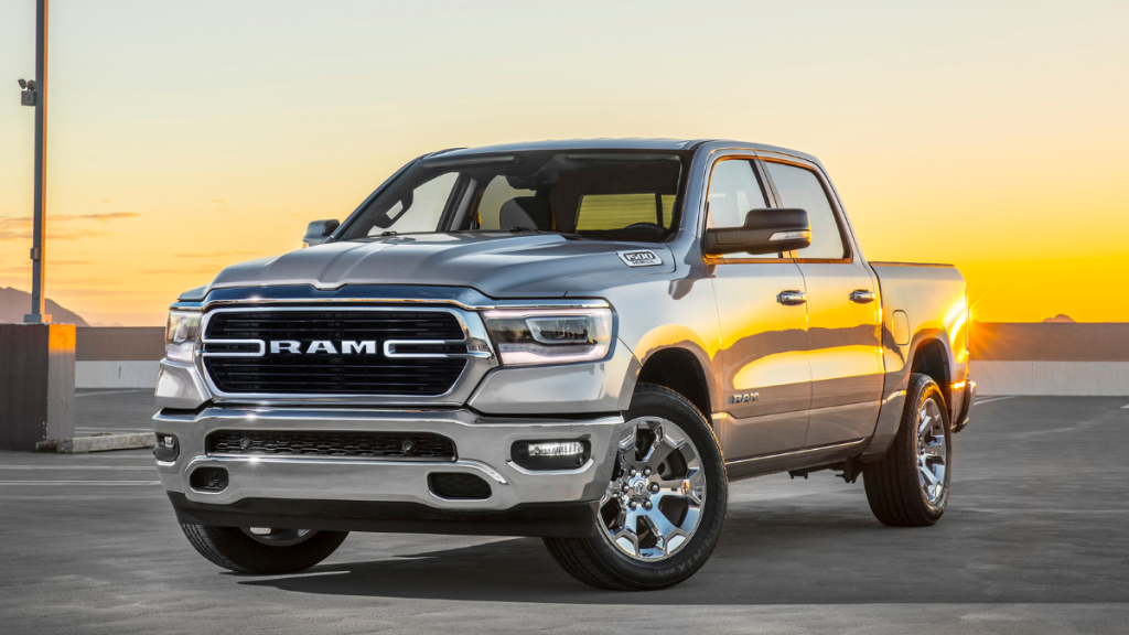 Silver 2022 Ram 1500 Big Horn pickup truck with sunset, highlighting Consumer Reports best deals to save money