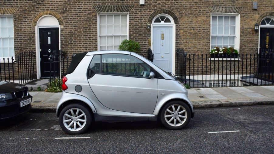 A non-electric version of the Smart ForTwo mini car parked in London, England
